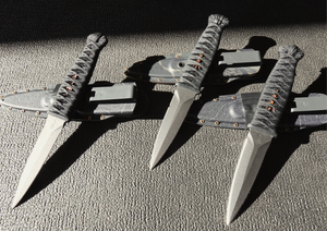 JC DAGGER BLACK CORDAGE + RAY SKIN + PATINA BRASS TRIDENT